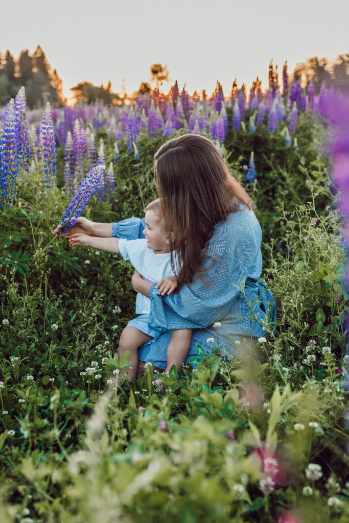 picking flowers with baby